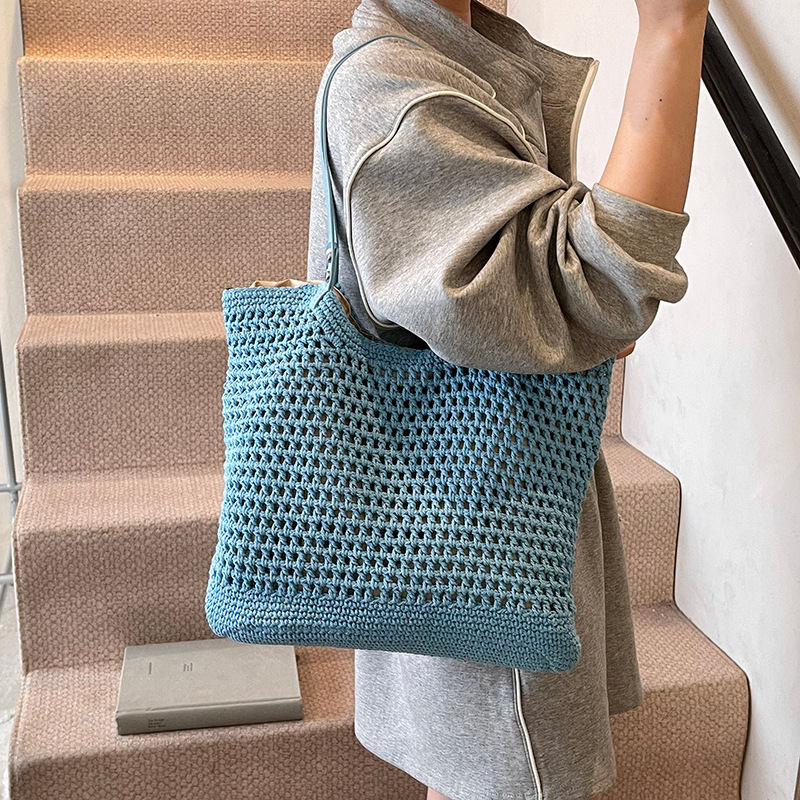 Hollowed-out knitted large-capacity bucket bag for women, 2025 new style, versatile for seaside vacation, beach and commuting, single-shoulder bag details Picture