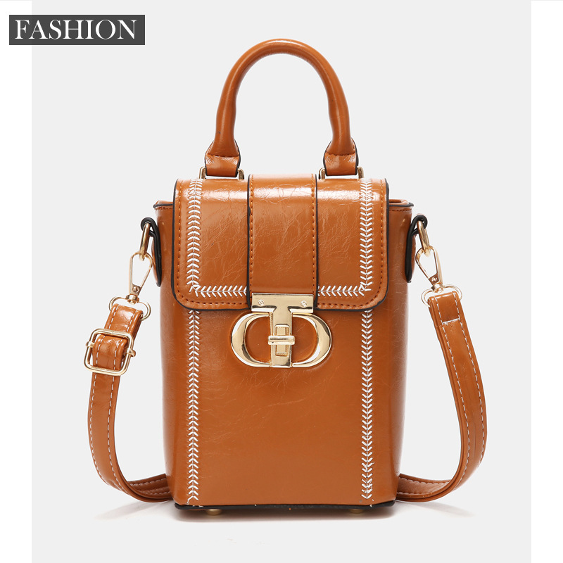 This is a popular and niche mini handbag for women, a new 2024 model with a high-end feel. It's a versatile crossbody phone case details Picture