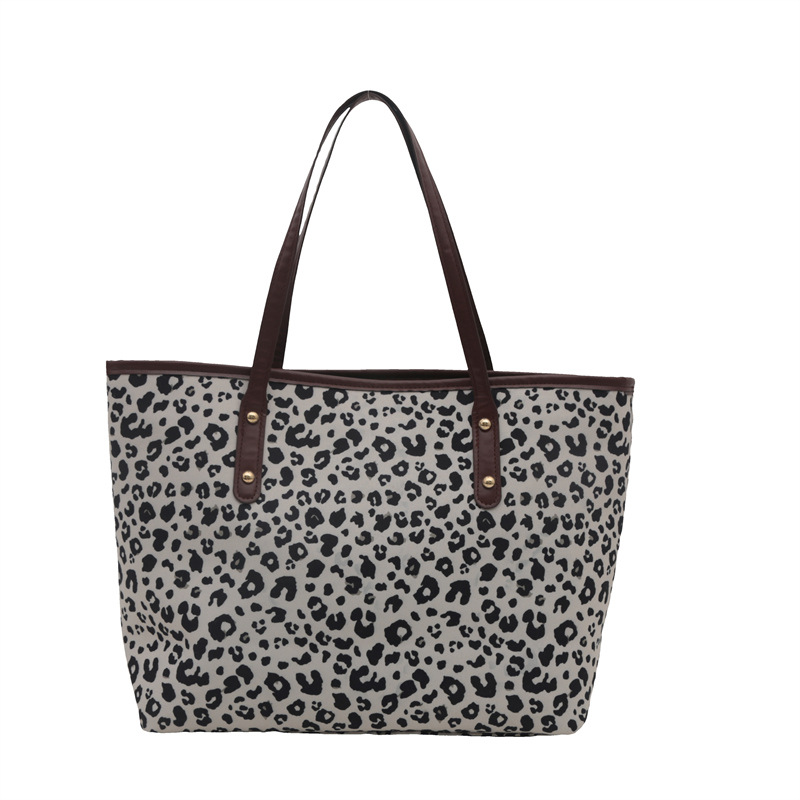 Spring 2025 new large-capacity handbag, commuter single-shoulder tote bag, fashionable, simple and artistic, hand-held armpit bag Item Picture