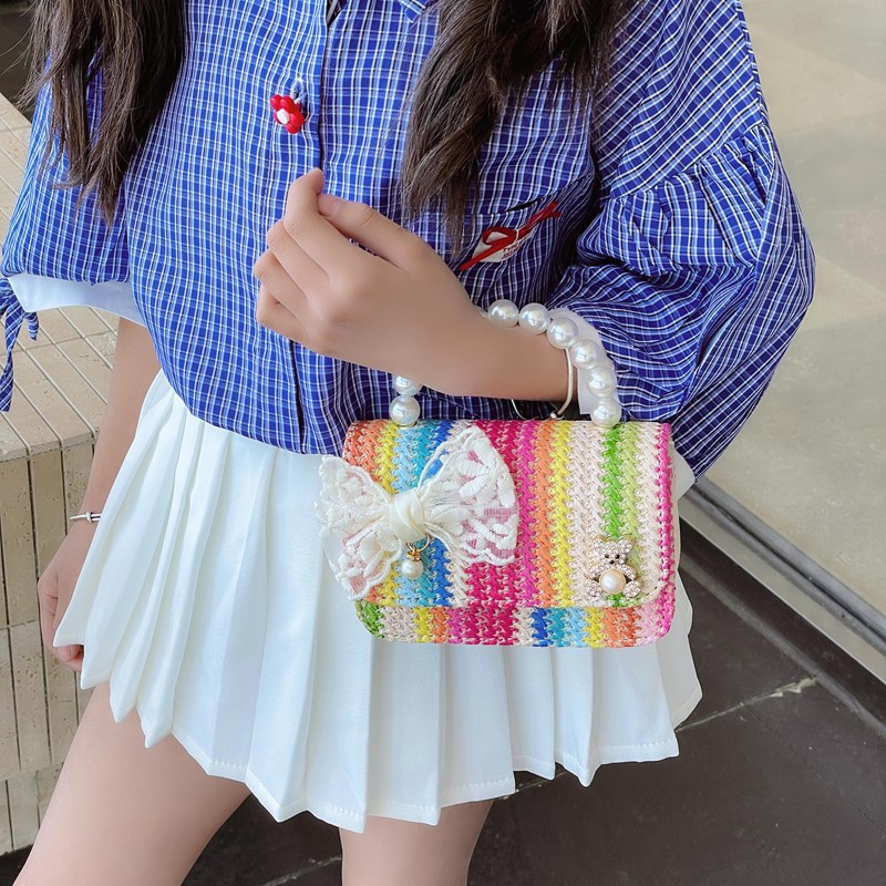 2025 Summer New bow straw woven bag, pearl hand-held crossbody small chanel-style fashionable children's bag, girls' backpack details Picture