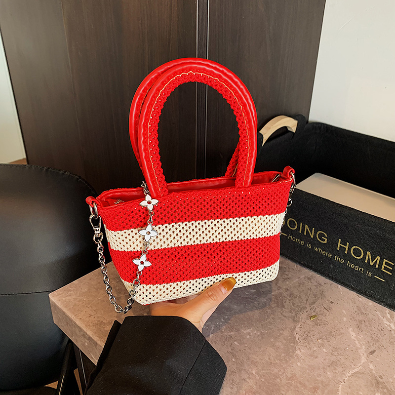 Summer 2025 new style woven striped handbag, Korean version mesh hollowed-out bucket women's chain single-shoulder crossbody bag full figure
