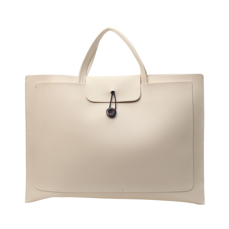 A simple and large-capacity handbag for women, a new style of fashionable and retro tote bag in 2024, a solid color for commuting to work Item Picture