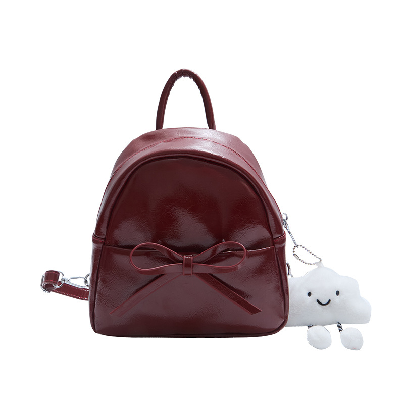 The 2025 spring new Korean-style bow mini backpack, a retro oil-leather women's pu crossbody bag, is a cross-border trend Item Picture