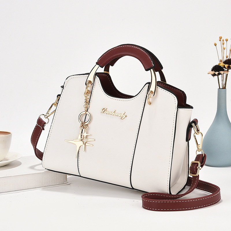 Cross-border delivery of 2024 Spring new fashionable and high-quality star-shaped pendant women's simple single-shoulder crossbody handbag full figure