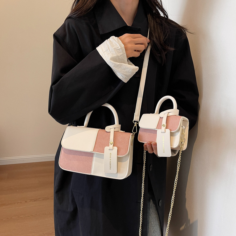 Wholesale of the 2023 Autumn and winter new matte patchwork mini hand-held parent-child style crossbody accessory small crossbody bag details Picture