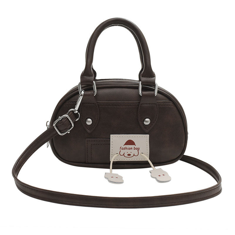This is a simple, fashionable and versatile small bag for women. It features a niche design and is a popular single-shoulder crossbody bag for casual use Item Picture