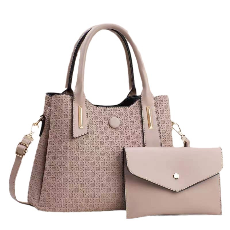 The 2024 new style of embossed women's handbag for foreign trade is simple, elegant, fashionable and stylish. It is a single-shoulder crossbody women's bun mother bag Item Picture