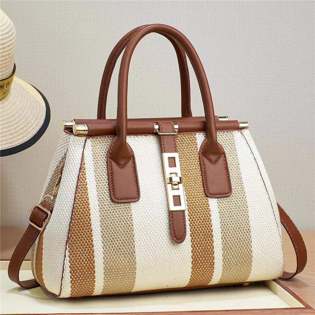 The 2023 new style of women's bag made of faux woven canvas material is noble and fashionable, with contrasting colors. It is a large-capacity cross-border bag for single-shoulder, crossbody and hand-carry Application Scenario