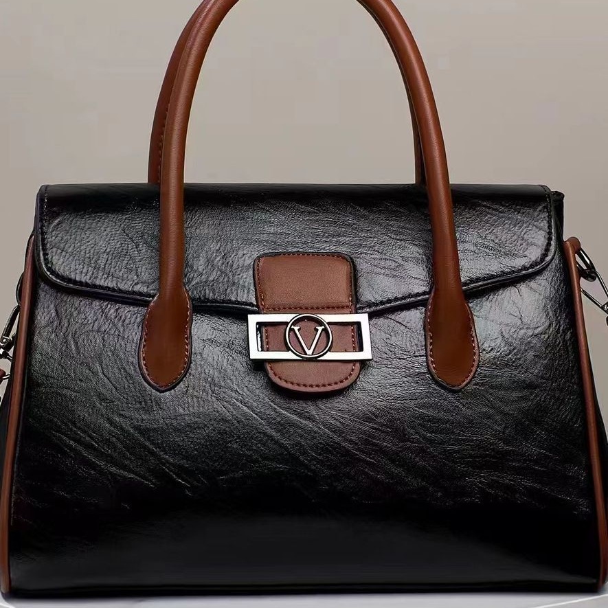 A new Korean-style stylish commuter women's bag for foreign trade, with a large capacity, fashionable and simple design, hand-held shoulder, and a soft leather-like tote bag full figure