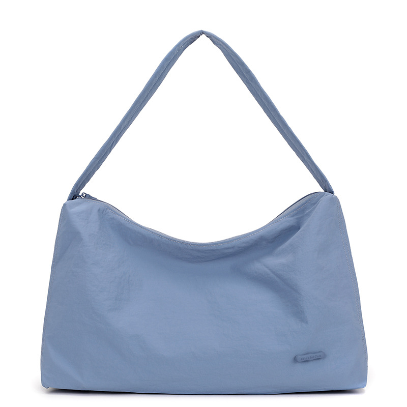 Colorful Fox Japanese and Korean Instagram drawstring underarm single-shoulder women's bag, laid-back and simple solid color commuting dumpling bag Item Picture
