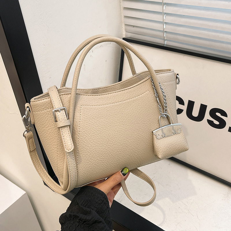 A simple and versatile hand-held bucket bag for women, a new Korean-style single-shoulder bag for work and commuting in 2024, a fashionable and high-end women's bag Specification drawing