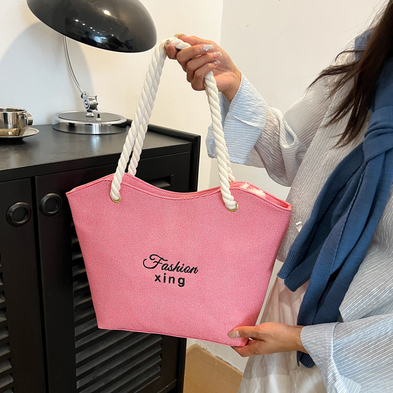 Fashionable straw woven letter tote bag 2025 summer new single-shoulder bag Casual ins forest-style beach bag women's bag full figure