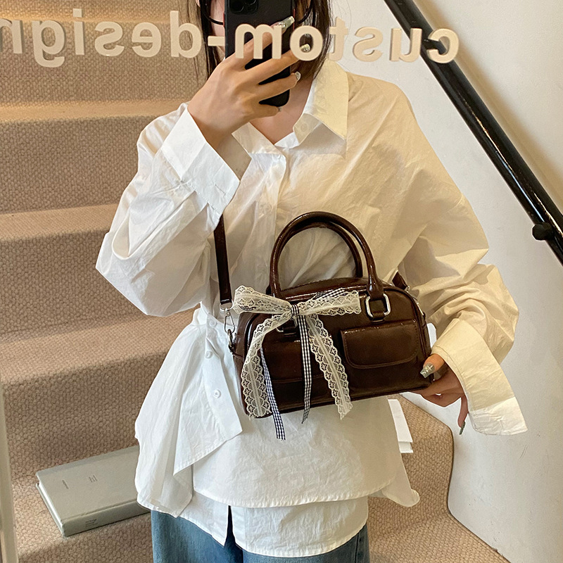 Cross-border casual hand-held Boston bag for women 2025 New Korean style simple and versatile bow single-shoulder crossbody bag details Picture