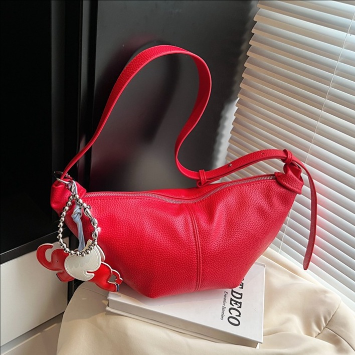A small, exquisite and high-end soft-skin dumpling bag for women 2025 new lightweight and niche design solid color single-shoulder crossbody bag full figure