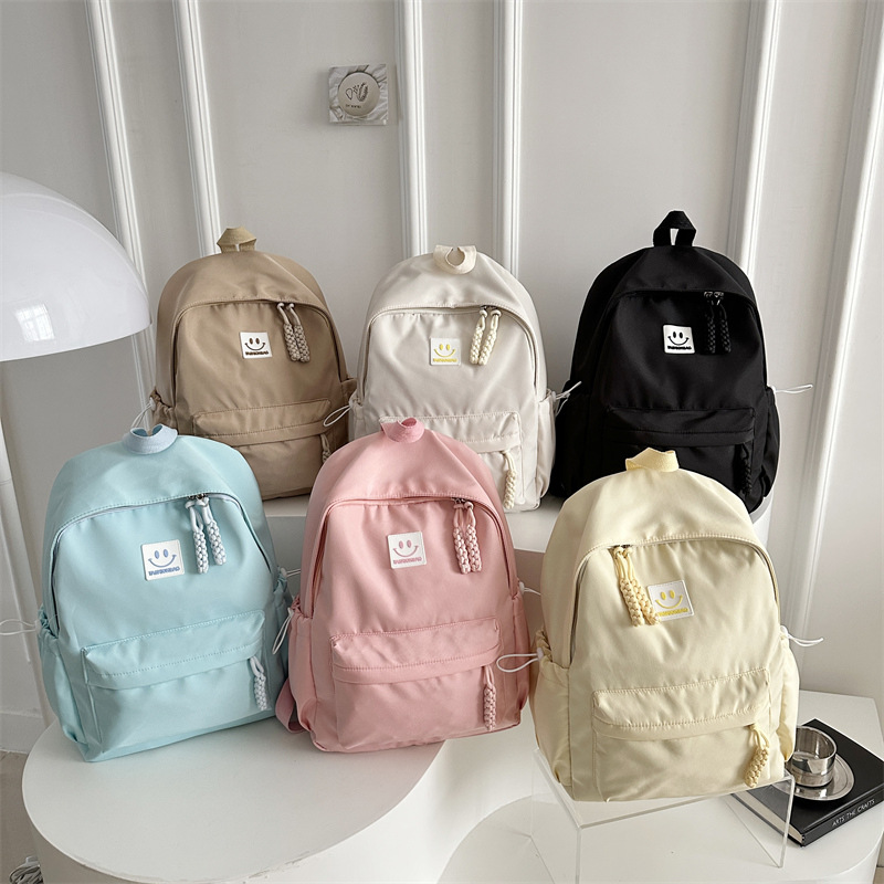 Japanese-style soft girl large-capacity backpack, a niche and simple design for girls, a backpack for junior high school students, a small backpack for girls' spring outing Application Scenario