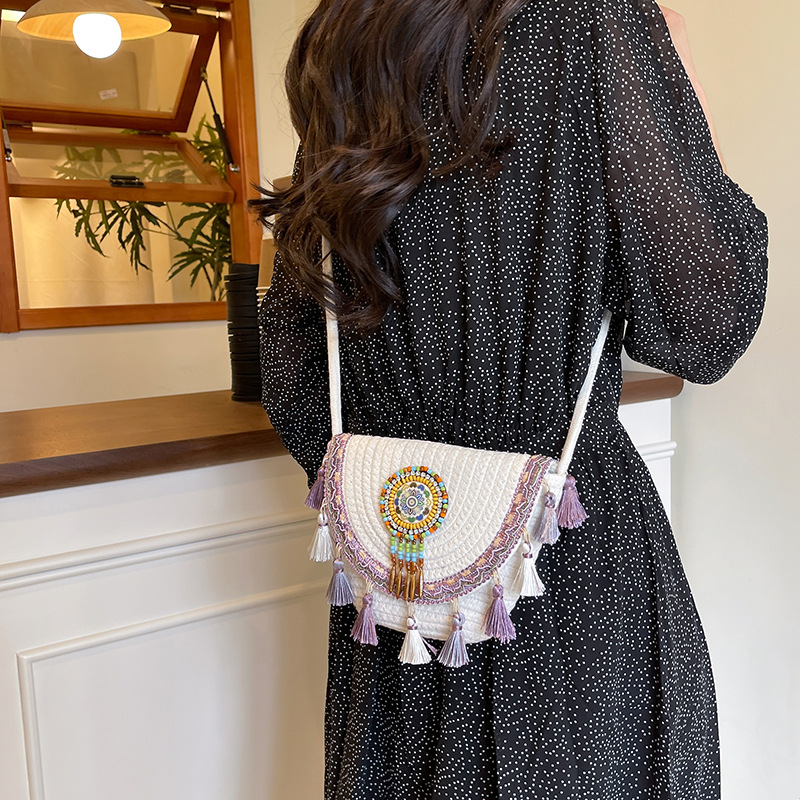 2025 New style simple ethnic style fashionable and trendy straw woven bag with tassel balls, simple crossbody shoulder bag Specification drawing