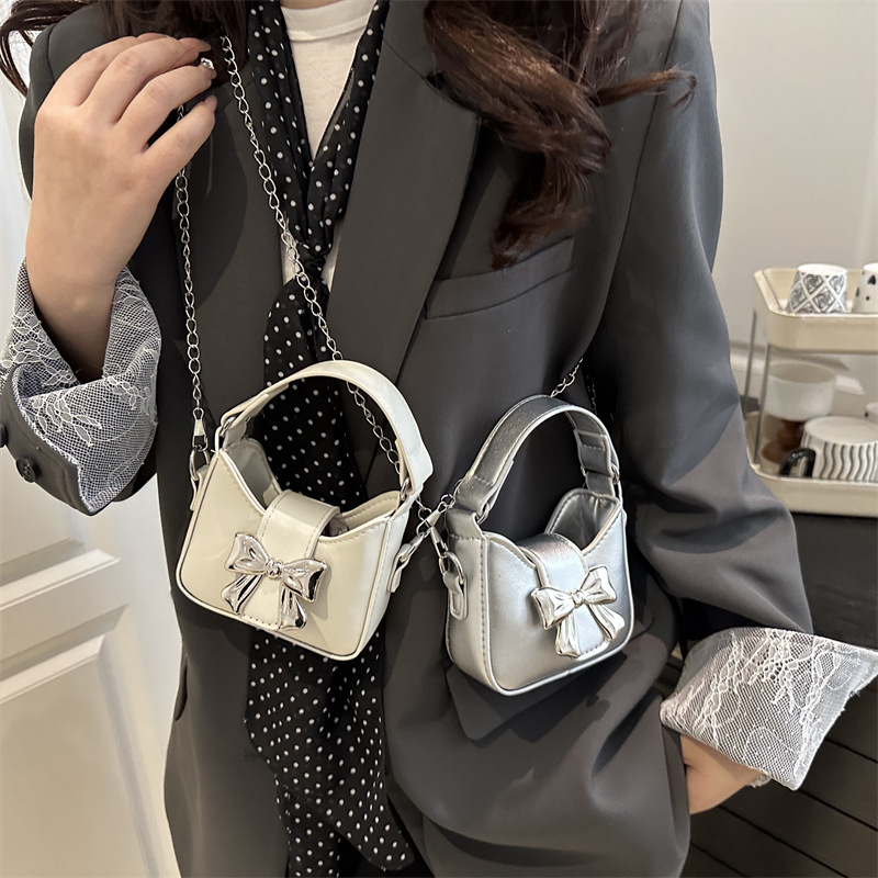 Niche bow handbag, 2025 new Korean version mini chain crossbody bag, fashionable lipstick, headphones, single-shoulder bag details Picture