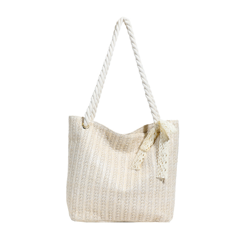 A new 2025 trendy, fashionable and fresh single-shoulder bag made of straw weaving. It is a simple underarm tote bag Item Picture
