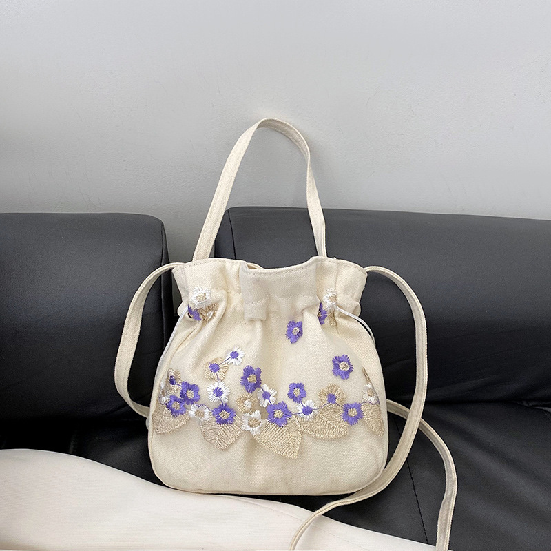2024 New style simple nylon embroidered flower hand-held commuter bucket bag, Chinese-style single-shoulder crossbody bag full figure