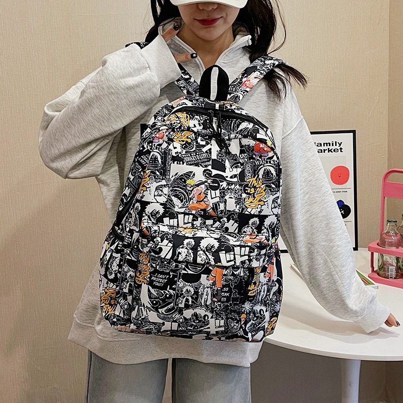 A new IINs-style simple campus backpack with a unique student graffiti style and a large-capacity casual backpack details Picture