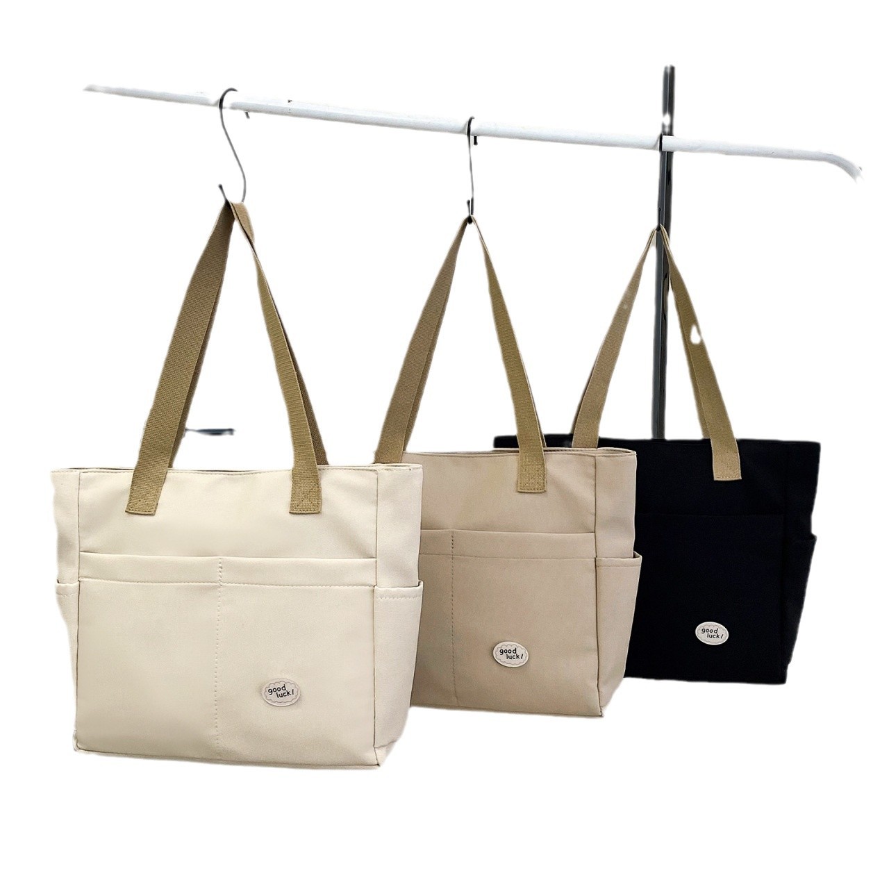 Large-capacity work commuting bag, new autumn and winter single-shoulder hand-held canvas bag, fashionable and versatile, single-shoulder crossbody bag for women Item Picture