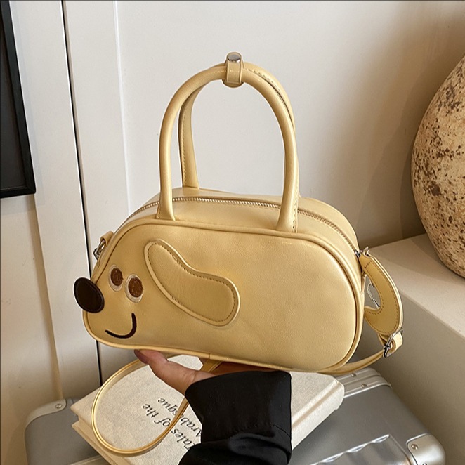A niche design with a fun Dachshund handbag for women in 2025, a new retro and simple solid color single-shoulder crossbody bag full figure