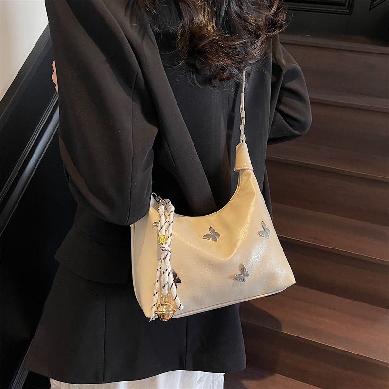 A high-end and niche design bag for women 2025, a new fashionable single-shoulder crossbody bag, simple and casual hand-held dumpling bag full figure