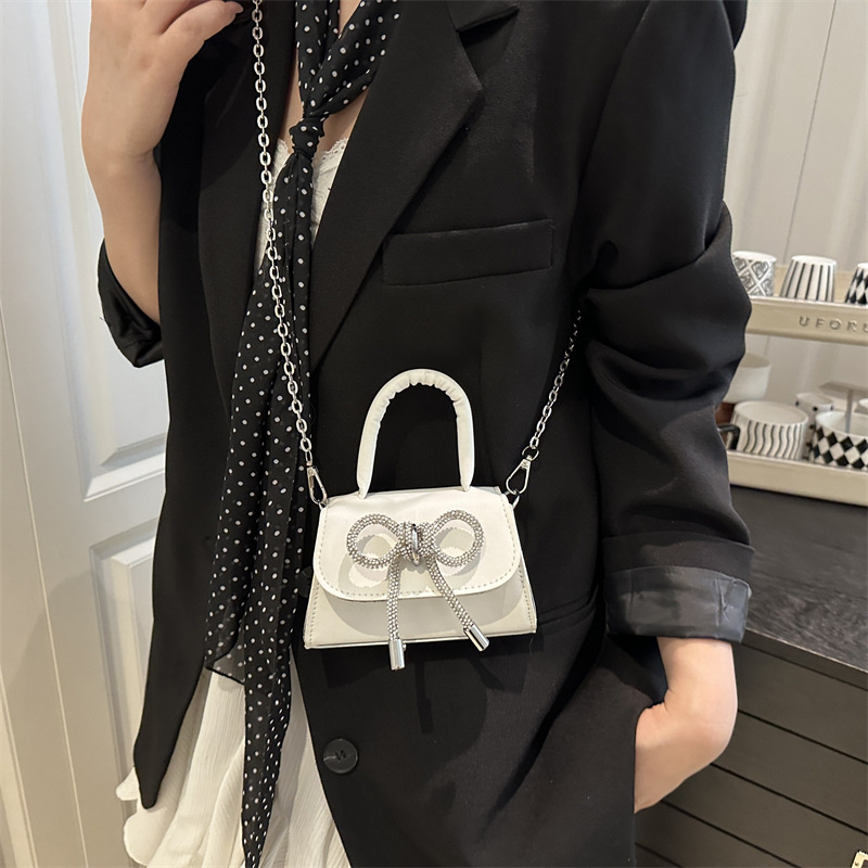 High-end quality bow small bag for women's summer 2025, new chain crossbody mouth red envelope hand-held mini square bag details Picture