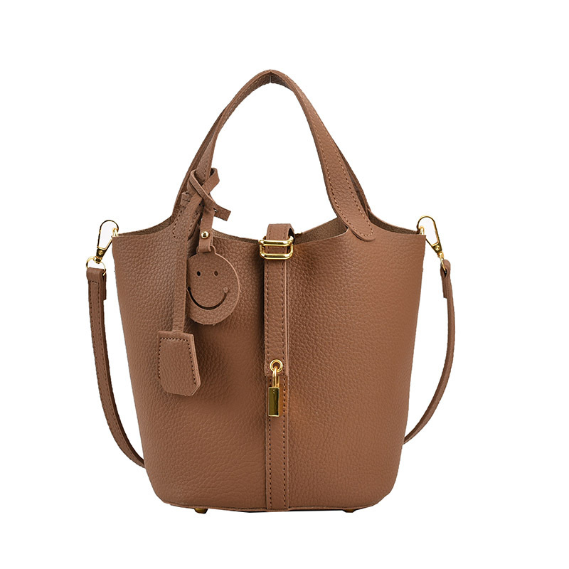 A new niche design women's handbag with lychee pattern in solid color, a simple and casual bucket bag for ladies, and a hand-held bag Item Picture