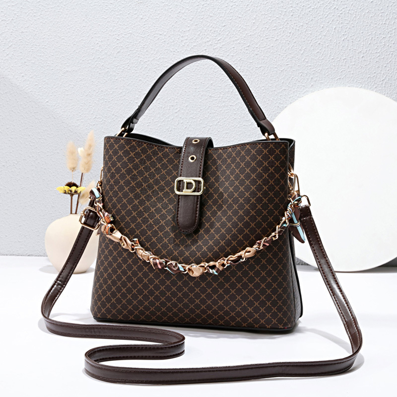 This year, bucket bags are in vogue for women. 2023 new fashionable printed hand-held women's bags and niche single-shoulder crossbody bags are available for delivery full figure