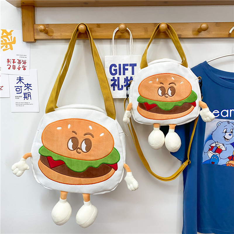 A new cartoon canvas burger crossbody handbag with large capacity, a trendy Japanese style and a girlish heart, a school backpack and birthday gift full figure