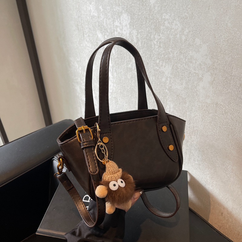 Simple and versatile hand-held bucket bag for women, 2024 new fashion trend single-shoulder bag, high-end and niche design crossbody bag details Picture