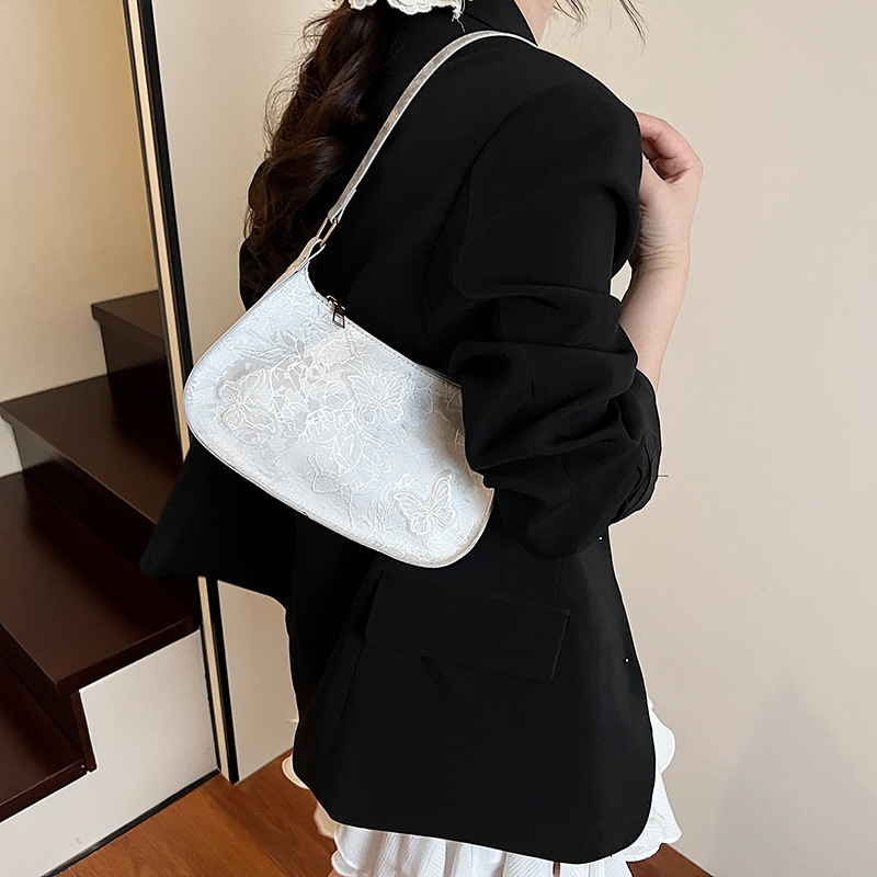 The new 2025 underarm bag for women, featuring a high-end and stylish design, is a niche butterfly ins fashion commuting single-shoulder bag Specification drawing