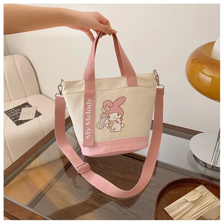 New cartoon canvas hand-held shoulder crossbody bag, cute office commuting document bag, bucket bag manufacturer wholesale version details Picture