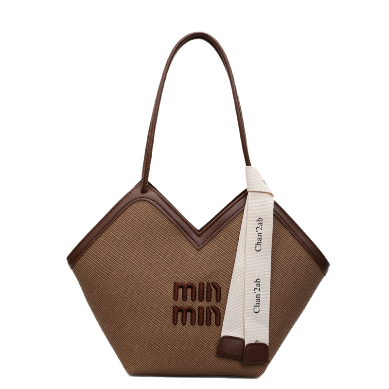 The new large-capacity tote bag for women in 2025 is fashionable and versatile. It features a contrasting color underarm bag for casual use, classes and commuting. It's a trendy single-shoulder bag Item Picture