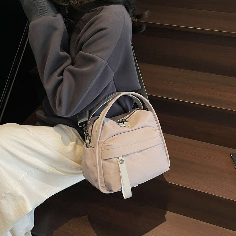2025 New simple, lightweight, casual, fashionable and versatile handbag for women, solid color commuting multi-pocket single-shoulder crossbody bag Specification drawing