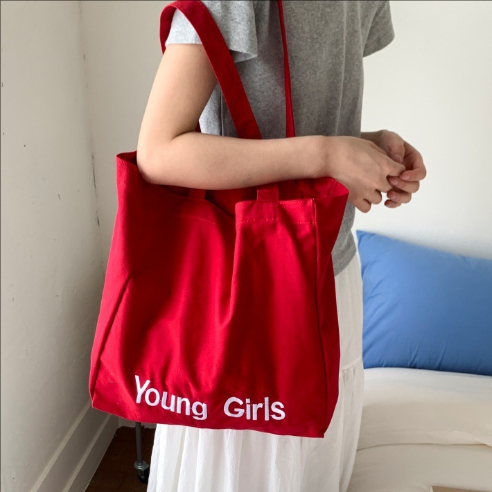 2025 New trendy lettered canvas bag for women with a laid-back style, large-capacity bucket bag, casual and versatile, fashionable single-shoulder bag full figure
