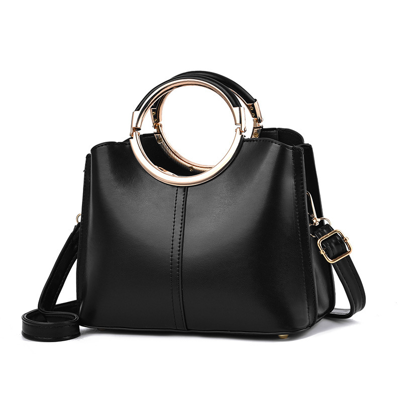 The new round handbag is a Korean version of a fashionable women's single-shoulder crossbody bag. It is simple, large-capacity and multi-layered for women Item Picture