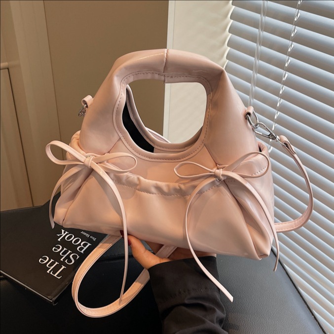 The Korean Instagram niche design pleated bow handbag is a super popular and fashionable single-shoulder crossbody bag for women in 2025 full figure