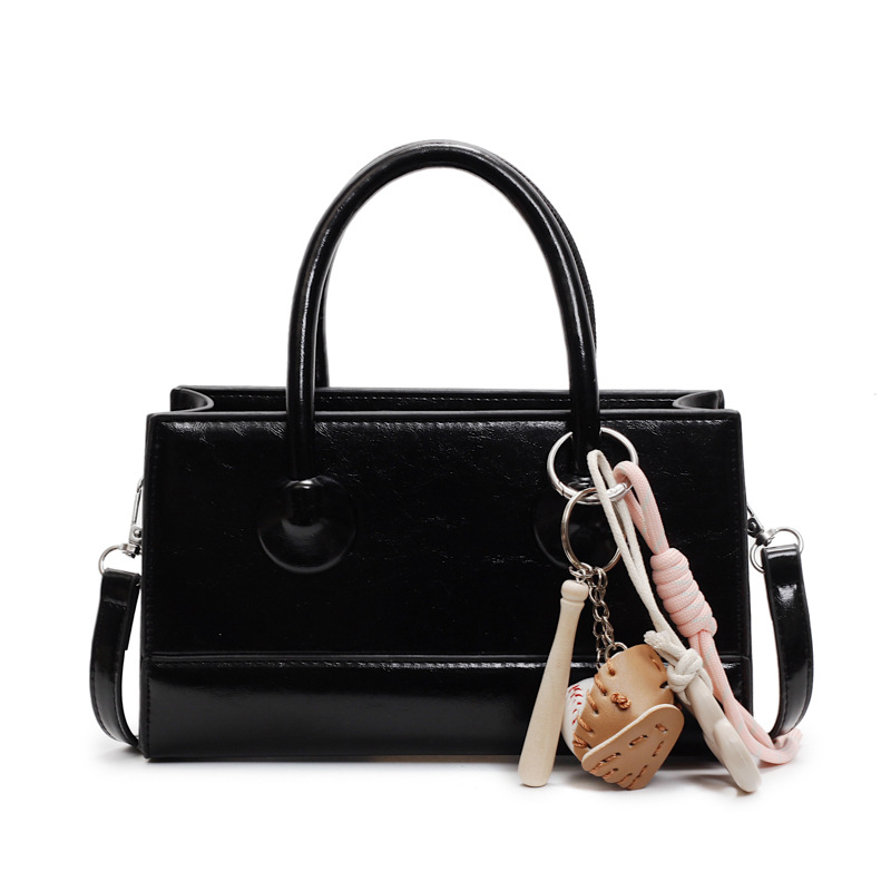 The Korean style Instagram simple and stylish small bag for women 2025, a new hand-held small square bag, is fashionable and versatile for commuting crossbody Item Picture