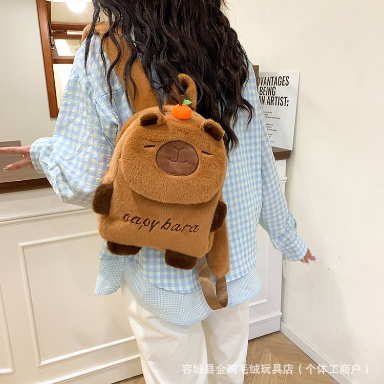 The new cute Capibara backpack features a high level of appearance and cartoon versatility. It's a student bag for girls and an ugly and cute capybara plush bag Application Scenario