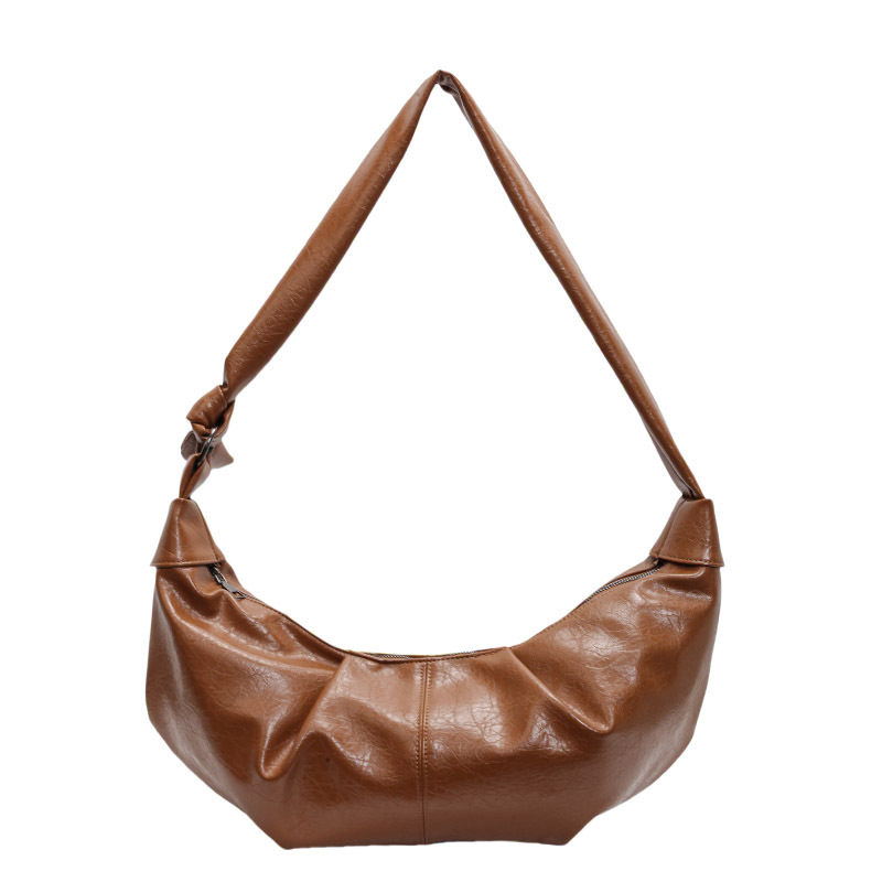 A niche design bag for women in 2024, a trendy and versatile single-shoulder underarm bag with a high-end and stylish look. It's a large crossbody bag Item Picture