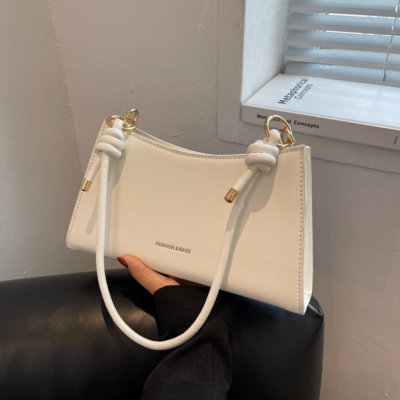 Personalized French candy-colored underarm women's bag 2025 new style, fashionable and simple single-shoulder bag, stylish hand-carried baguette bag details Picture