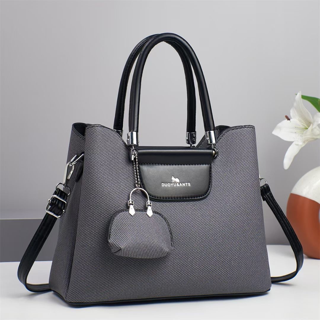 The new trend of mother and child handbags lies in the high-quality single-shoulder bags, fashionable and versatile Korean-style niche design crossbody bags for export full figure
