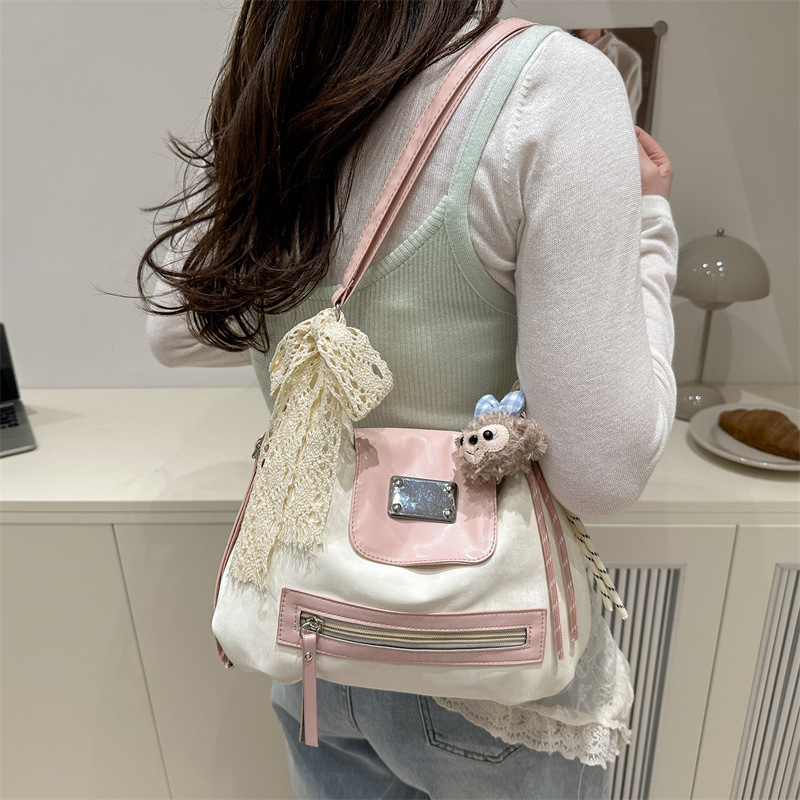 A trendy and niche design backpack with a new large-capacity multi-purpose tote bag for women, a light spring student single-shoulder bag details Picture