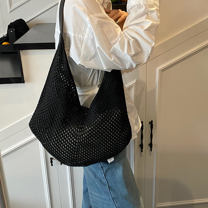 High-end soft surface hollowed-out knitted large-capacity underarm bag for women, 2025 new style, versatile and fashionable solid color single-shoulder bag full figure