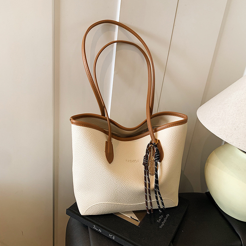 Retro large-capacity bag for women, 2025 new trendy Korean niche tote bag, versatile and simple single-shoulder armpit bag full figure