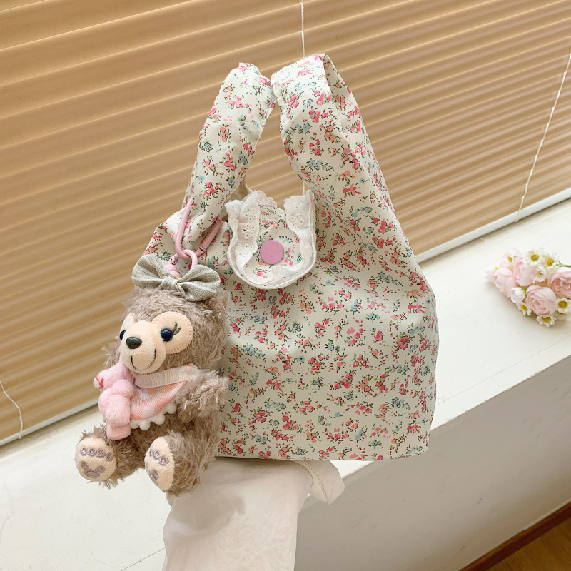 Korean large-capacity floral bag for women, 2025 new pleated cloud bag, a niche dual-purpose tote commuter crossbody bag full figure