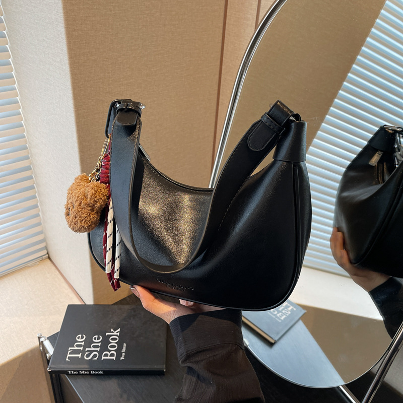 High-end and niche women's 2024 new retro single-shoulder crossbody bag for casual work and fashionable commuting dumplings details Picture