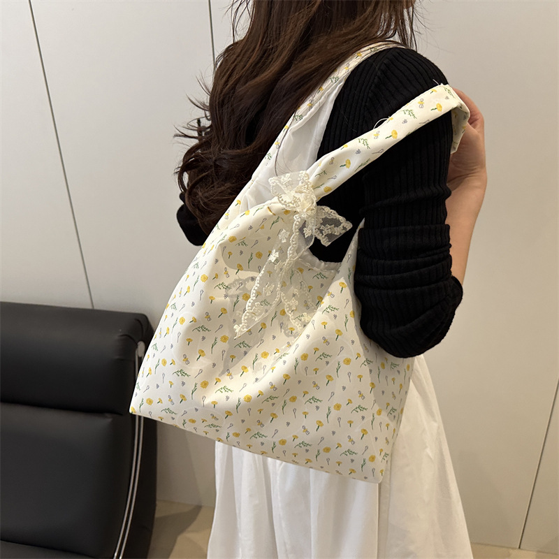 The 2025 summer new large-capacity single-shoulder commuter women's canvas floral print bag and versatile bow tote bag Specification drawing